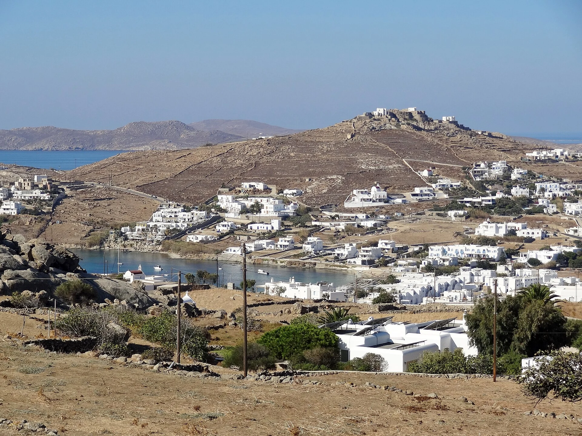 Book Mykonos more quietly: villa, bay and daily rhythm.